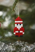 Beaded Christmas decoration in tree