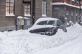 Car under snow, Stockholm Old Town. Stockholm, Sweden