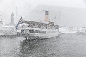 Ferry at storm on sea, Skeppsbron, Stockholm, Sweden