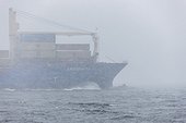 Cargo ship at storm on sea, Saltsjon, Stockholm, Sweden