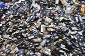 Heap of old videocassettes on garbage dump