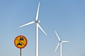 No entry sign and wind turbines