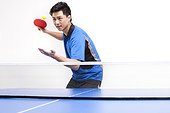 Table tennis player serving
