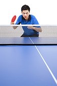 Table tennis player looking determined