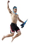 Man with swimming gear jumping in happiness