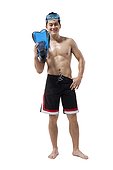 Shirtless muscular man holding swimming gear