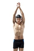 Muscular swimmer with arms raised