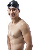 Muscular swimmer smiling