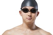 Swimmer with swimcap and goggles headshot