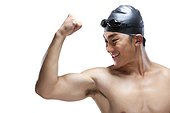 Swimmer flexing his muscles