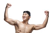 Swimmer with arms raised in celebration