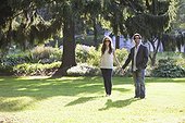Portrait of Young Couple Standing in Park, Ontario, Canada