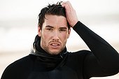 Portrait of young Man in wetsuit