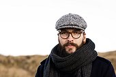 Portrait of Man with beard, sixpence and scarf