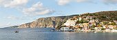 Panoramic of town and harbour of Assos at sunset. Kefalonia, Greek Islands, Greece