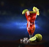 Singapore sling cocktail in tall glass against dark background
