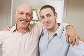 Portrait of father smiling with his son smiling