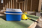 Hardhat and ice chest for carpenters