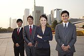 Young business men and business women in the office building