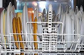 Cleaned dishes and cutleries in dishwasher
