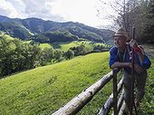Senior man leaning on railing in Middle Black Forest Baden-Württemberg, Germany