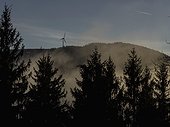 Silhouette of windmill over mountain during sunset in Black Forest, Baden-Wurttemberg, Germany