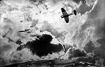 Roger-Viollet | 248529 | World War II. English airplane trying to destroy a V1 rocket in flight. Photomontage. | © LAPI / Roger-Viollet