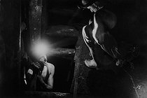 Roger-Viollet | 296463 | Miners in the mine of Merlebach. Freyming-Merlebach (France), 1958. Photograph by Jean Marquis (1926-2019). | © Jean Marquis / Roger-Viollet