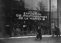 Roger-Viollet | 438869 | World war II. Exhibition of photographs of the French Waffen SS. Paris, Champs-Elysées, January 1944. | © LAPI / Roger-Viollet