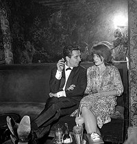 Roger-Viollet | 488710 | Gilbert Bécaud and Romy Schneider. Paris, Saint-Hilaire Club, 1962. | © Noa / Roger-Viollet