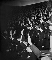 Roger-Viollet | 533653 | 1939-1945 War. Policemen taking the oath, in Chaillot palace, in Paris, January, 1942 (photograph forbidden by the censorship). | © LAPI / Roger-Viollet