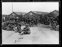 Roger-Viollet | 567424 | World War I. Arrival of the first US military contingents in France. US soldiers settling in their camp near Saint-Nazaire (France), late June 1917. Photograph published in the newspaper  Excelsior , late June 1917. | © Excelsior - L'Equipe / Roger-Viollet