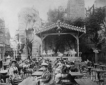 Roger-Viollet | 643774 | Open-air terrace of the Moulin Rouge cabaret. Paris, circa 1880. Photograph by Girot. | © Collection Roger-Viollet / Roger-Viollet