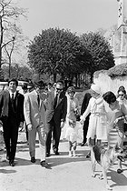 Roger-Viollet | 651821 | Baptême d'Anthony Delon, fils d'Alain Delon et de Nathalie le 1er mai 1966. Photographie de Georges Kelaïditès (1932-2015). | © Georges Kelaïditès / Roger-Viollet