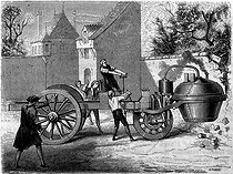 Roger-Viollet | 680339 | First steam motorcar tested by the French engineer Joseph Cugnot (1725-1804) inside the Arsenal of Paris, in 1770. | © Roger-Viollet / Roger-Viollet