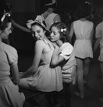 Roger-Viollet | 729633 | Young dancers in the wings of the Paris Opera, late 1930s. | © Gaston Paris / Roger-Viollet