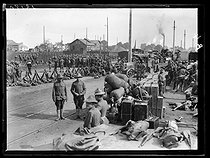 Roger-Viollet | 770026 | World War I. Arrival of the first US military contingents in France. Disembarking the equipment. Saint-Nazaire (France), late June 1917. Photograph published in the newspaper  Excelsior , on Sunday, July 1st, 1917. | © Excelsior - L'Equipe / Roger-Viollet