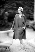 Roger-Viollet | 797685 | Suzanne Lenglen (1899-1938), French tennis player, presenting a suit designed by Jean Patou, circa 1930. | © Laure Albin Guillot / Roger-Viollet