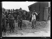 Roger-Viollet | 842973 | World War I. Arrival of the first US military contingents in France. US soldiers settling in their camp near Saint-Nazaire (France), late June 1917. Photograph published in the newspaper  Excelsior , late June 1917. | © Excelsior - L'Equipe / Roger-Viollet