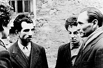 Roger-Viollet | 933734 | World War II. Missak Manouchian (second on the left) and two members of his group of Resistance fighters (Wasjbrot and Boczov), photographed by the German propaganda, shortly before their execution, February 1944. | © Roger-Viollet / Roger-Viollet