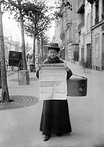 Roger-Viollet | 942785 | Milliner reading the newspaper  Le Petit Parisien . Paris, 1899. | © Jacques Boyer / Roger-Viollet