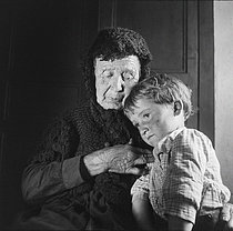 Roger-Viollet | 993264 | Old woman and her grandson. France, circa 1935. | © Gaston Paris / Roger-Viollet