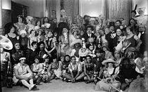 Roger-Viollet | 1011252 | Saint-Catherine's day at French fashion designer Paul Poiret's, with Josephine Baker (sitting in the middle), November 25, 1925. | © Boris Lipnitzki / Roger-Viollet