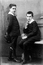 Roger-Viollet | 1059778 | Marcel Proust (on the right, 1871-1922), French writer, with his brother Robert (1873-1935), French surgeon, 1885. | © Albert Harlingue / Roger-Viollet