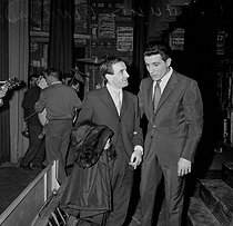 Roger-Viollet | 1079816 | Charles Aznavour (1924-2018), Armenian-born French singer-songwriter and actor, and Gilbert Bécaud (1927-2001), French singer-songwriter and pianist. Paris, Olympia. 1959. | © Roger-Viollet / Roger-Viollet