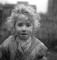 Roger-Viollet | 1086136 | Child in a suburb of Paris. France, 1936. | © Gaston Paris / Roger-Viollet