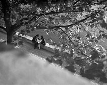 Roger-Viollet | 1199207 | Lovers on the banks of the river Seine. Paris, 1945. Photograph by René Giton known as René-Jacques (1908-2003). Bibliothèque historique de la Ville de Paris. | © René-Jacques / BHVP / Roger-Viollet