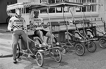 Roger-Viollet | 1350582 | Tour de France 1971. Pierre Martellozzo (born in 1947) and Raymond Deslile (1943-2013), French racing cyclists, during their day of rest. Le Touquet-Paris-Plage (France), on July 3rd, 1971. Photograph by Bernard Charlet, from the collections of the French newspaper  France-Soir . Bibliothèque historique de la Ville de Paris. | © Bernard Charlet / Fonds France-Soir / BHVP / Roger-Viollet
