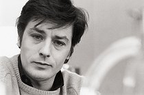 Roger-Viollet | 1376709 | Alain Delon (born in 1935), French actor, at the premises of the French magazine  L'Express . Paris, 1969. Photograph by André Perlstein (born in 1942). | © André Perlstein / Roger-Viollet