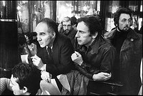 Roger-Viollet | 1378118 | Michel Picolli (1925-2020) and Jean-Louis Trintignant (born in 1930), French actors, on the set of the film 'L'attentat' by Yves Boisset. France, 1972. Photograph by André Perlstein (born in 1942). | © André Perlstein / Roger-Viollet